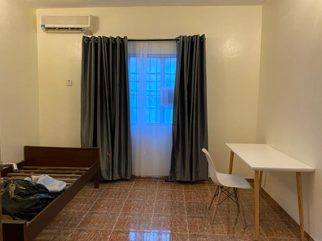 Well furnished room at Rilwan AJALA Homes Enterprise Yaba Lagos with clean interior and air conditioning